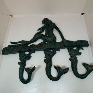 Cast iron mermaid coat rack